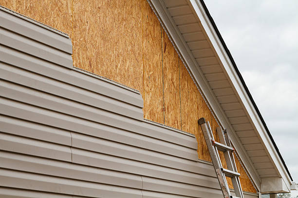Professional Emergency Siding Repair technician working in White, PA